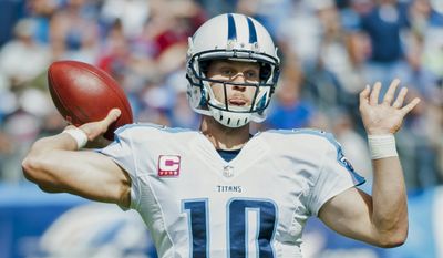 Tennessee Titans quarterback Jake Locker (10) throws a pass during the Titans&#39; 29-28 loss to the Cleveland Browns on Sunday, Oct. 5, 2014, at LP Field in Nashville, Tenn. (AP Photo/The Daily News, Austin Anthony)