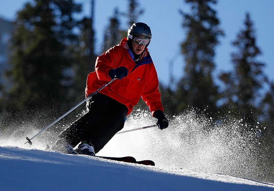 A skier enjoys the slopes at Arapahoe Basin Ski Area on Oct 17 in Keystone, Colo., the first ski area in the United States to open for the season. (AP Photo/ Colorado Ski Country USA, Jack Dempsey)