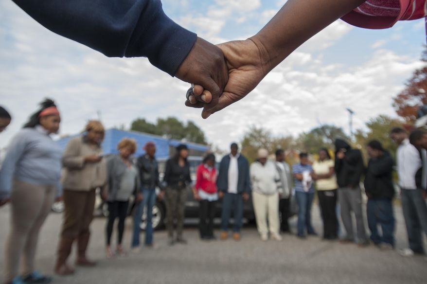(FILE - AP Photo/Detroit News, David Guralnick) DETROIT FREE PRESS OUT, HUFFINGTON POST OUT, MAGS OUT, MANDATORY CREDIT