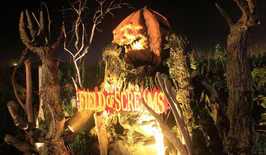 A large animatronic Pumpkinhead greets guests before getting on the Haunted Hayride at the Field of Screams in Mountville, Pennsylvania. (Photograph by Jacquie Kubin / Special to The Washington Times)