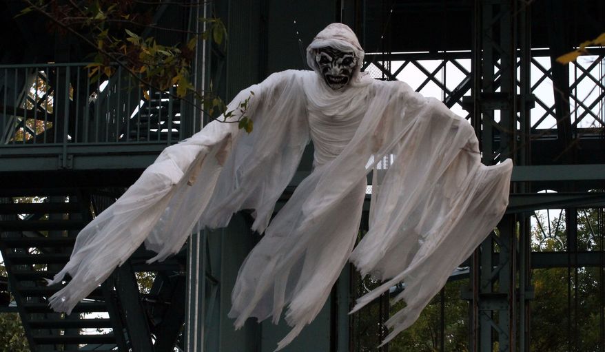 A flying ghost at King's Dominion's Halloween Haunt in Doswell, Virginia. (Photograph by Jacquie Kubin / Special to The Washington Times)