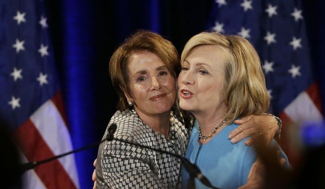 Former Secretary of State Hillary Rodham Clinton, right, is embraced by House Minority Leader Nancy Pelosi, left, before speaking at a fundraiser for Democratic congressional candidates hosted by Pelosi at the Fairmont Hotel, Monday, Oct. 20, 2014, in San Francisco. (AP Photo/Eric Risberg) ** FILE **