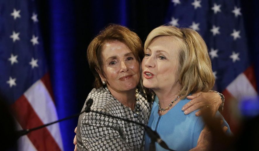Former Secretary of State Hillary Rodham Clinton, right, is embraced by House Minority Leader Nancy Pelosi, left, before speaking at a fundraiser for Democratic congressional candidates hosted by Pelosi at the Fairmont Hotel, Monday, Oct. 20, 2014, in San Francisco. (AP Photo/Eric Risberg) ** FILE **