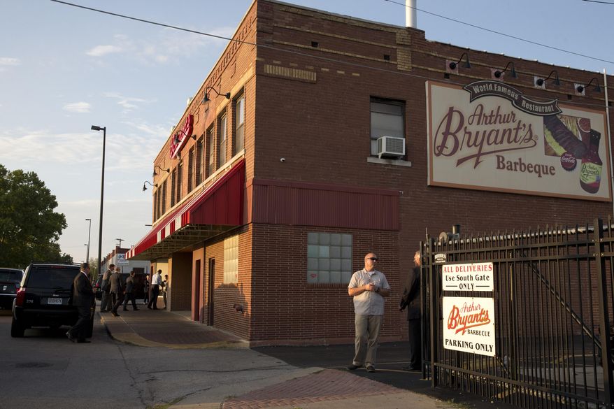 FILE - This July 29, 2014 photo shows Arthur Bryant's, the legendary barbecue restaurant in Kansas City, Mo., on the day President Barack Obama visited. Bryant's is a must-stop for politicians, having hosted everyone from Harry Truman to Jimmy Carter to Sarah Palin and John McCain. Bryant's is considered the grandfather of barbecue in Kansas City and has been at its current location since 1958, with roots going back to the city's first barbecue stand in the early 20th century. (AP Photo/Jacquelyn Martin, File)