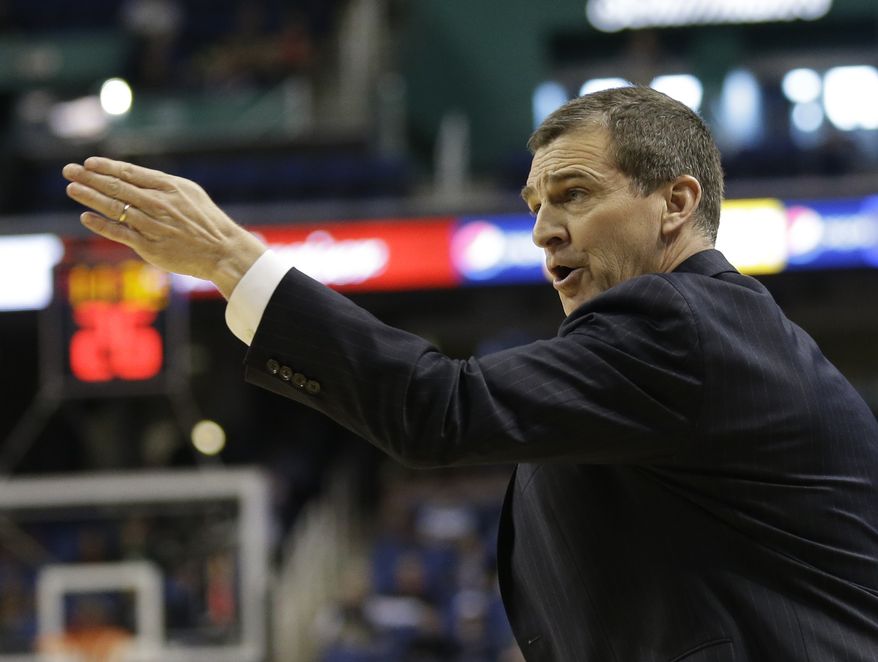 Maryland head coach Mark Turgeon directs his team against Florida State during the first half of a second round NCAA college basketball game at the Atlantic Coast Conference tournament in Greensboro, N.C., Thursday, March 13, 2014. (AP Photo/Gerry Broome)
