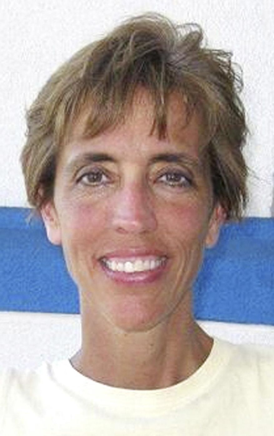 FILE - This undated photo provided by the Sidney, Mont., Police Dept. shows missing Sidney High School math teacher Sherry Arnold. A plea agreement with prosecutors filed Tuesday, Oct. 21, 2014, calls for a 100-year sentence for Michael Keith Spell, 25, on a charge of deliberate homicide for the 2012 death of Arnold. A charge of attempted kidnapping would be dropped. (AP Photo/Sidney Montana Police Dept., File)