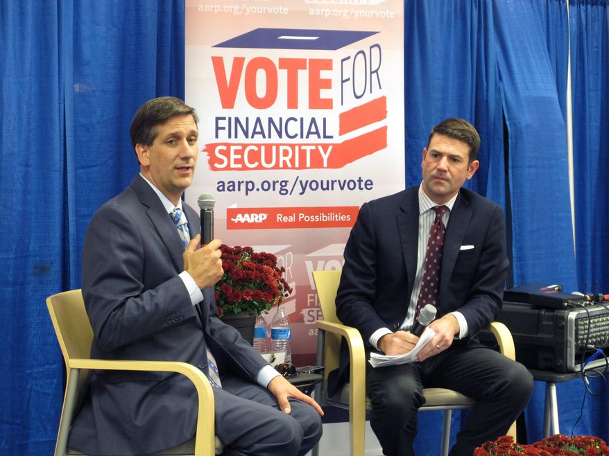 In this Oct 15, 2014 photo, Democratic candidate for governor Vincent Sheheen, left, speaks at a forum sponsored by AARP at the South Carolina State Fair in Columbia, S.C. Sheheen is running hard in the final weeks of his rematch against Gov. Nikki Haley, even with poll numbers showing he is slipping further behind. (AP Photo/Jeffrey Collins)