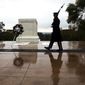 Tomb guards walks at the Tomb of the Unknown Soldier in Arlington National Cemetery in Arlington, Va., Wednesday, Oct. 22, 2014. (AP Photo/Manuel Balce Ceneta)  ** FILE **