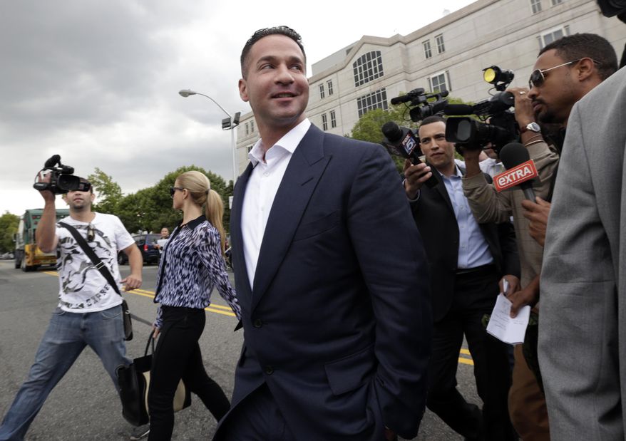 FILE - In this Wednesday, Sept. 24, 2014, file photo, Mike "The Situation" Sorrentino leaves the Martin Luther King Jr. Federal Building & Courthouse, in Newark, N.J., after a court appearance. Sorrentino and his brother Marc face an arraignment Thursday, Oct. 23, 2014, in Newark, to face federal tax charges. (AP Photo/Julio Cortez, File)