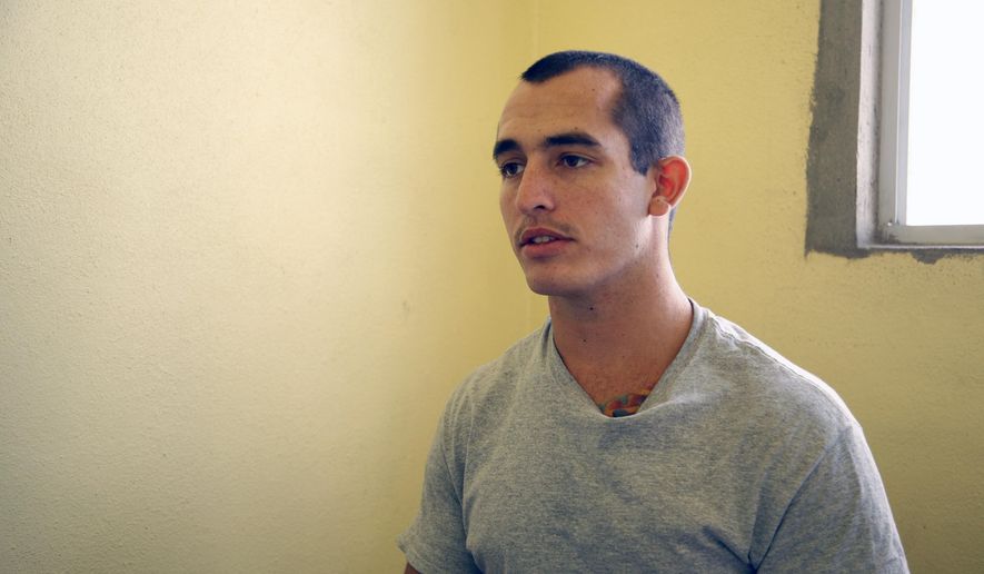 This May 3, 2014, photo shows Sgt. Andrew Tahmooressi left, who is being held at Tijuana&#39;s La Mesa Penitentiary. His lawyer is relying on the argument to win his freedom in the shortest time possible: He needs to be release so he can go home to get treatment for his combat-related post-traumatic stress, which Mexican authorities don&#39;t treat, even in their own soldiers. (AP Photo/UT San Diego, Alejandro Tamayo)