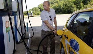 Russian President, Vladimir Putin pumping gas. 