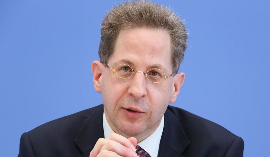 In this June 11, 2013, file picture, the president of the Federal Office for the Protection of the Constitution, Hans-Georg Maassen attends a press conference in Berlin, Germany. (AP Photo/dpa,Stephanie Pilick,File)