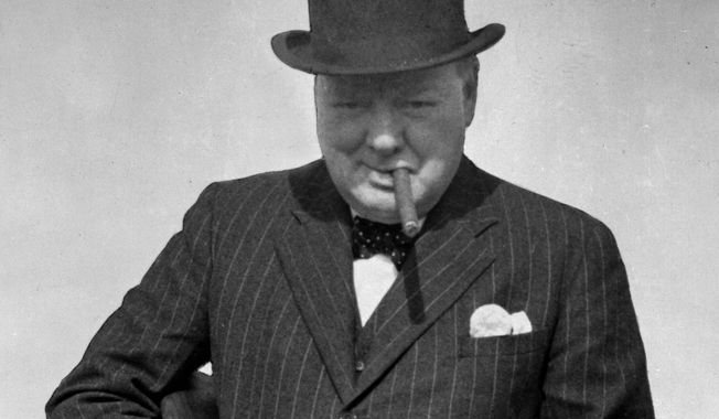 In this photo provided by the British government, Britain&#x27;s Prime Minister Winston Churchill tries a Tommy Gun during a visit to north-east England, Aug. 1, 1940, to inspect coastal fortifications and defence works. The background behind Churchill has been blotted out by the censor. (AP Photo/British Official Photo)