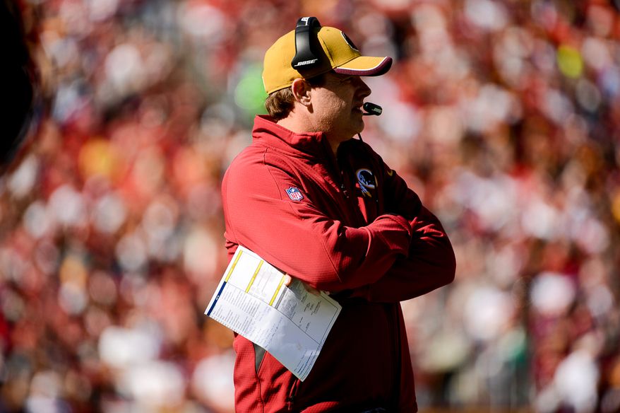 Washington Redskins head coach Jay Gruden watches game action in the first quarter as the Washington Redskins play the Tennessee Titans at FedEx Field, Landover, Md., Sunday, October 19, 2014. (Andrew Harnik/The Washington Times)