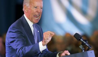 Vice President Joe Biden speaks Monday, Oct. 27, 2014, at the IBEW Local 364 hall in Rockford, Ill.  The vice president headlined the rally in Rockford to support U.S. Rep. Cheri Bustos and Gov. Pat Quinn.  (AP Photo/Rockford Register Star, Max Gersh )  MANDATORY CREDIT