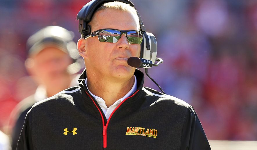Maryland coach Randy Edsall watches during the second half of an NCAA college football game against Wisconsin, Saturday, Oct. 25, 2014, in Madison, Wis. Wisconsin won 52-7. (AP Photo/Andy Manis)