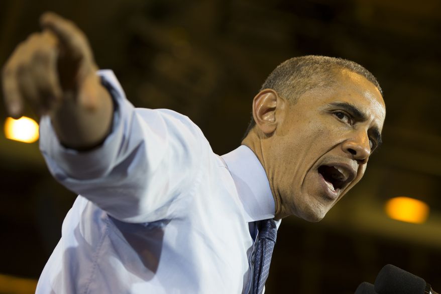 President Barack Obama speaks during a campaign rally for Wisconsin Democratic Gubernatorial candidate Mary Burke at North Division High School on Tuesday, Oct. 28, 2014, in Milwaukee. (AP Photo/Evan Vucci)