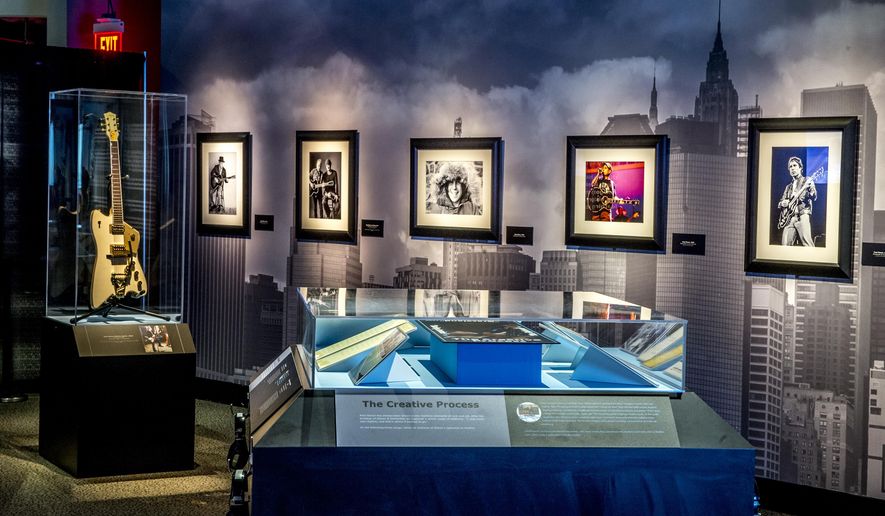 This image released by the Rock and Roll Hall of Fame and Museum shows memorabilia of musician Paul Simon in a new exhibit, "Paul Simon: Words & Music," chronicling Simon’s career debuting at the Rock and Roll Hall of Fame and Museum in Cleveland, Ohio, on Thursday, Oct. 30, 2014. (AP Photo/Rock and Roll Hall of Fame and Museum)