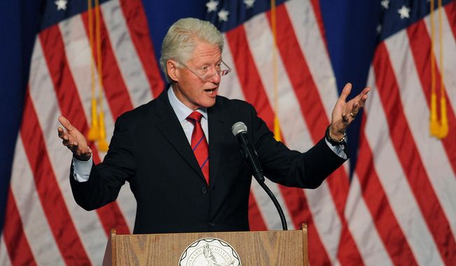 Former President Bill Clinton speaks at a Get Out the Vote rally in the Oxnard College gym in Oxnard, Calif., Wednesday, Oct. 29, 2014. Clinton came to the aid of California&#x27;s vulnerable congressional Democrats stumping for two House members facing tough re-election contests. (AP Photo/Ventura County Star, Rob Varela)