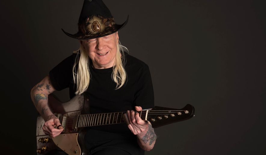 This March 30, 2013 photo provided by Kid Logic Media shows Johnny Winter at the Carriage House Recording Studios in Stamford, Conn. Winter died in a hotel room just outside Zurich at age 70 in July 2014. The Texas blues legend had just finished recording “Step Back,” an album of mainly blues standards released posthumously last month, that spent three weeks atop Billboard’s blues albums chart and features Eric Clapton, Dr. John and Joe Perry. (AP Photo/Kid Logic Media, Michael Weintrob)