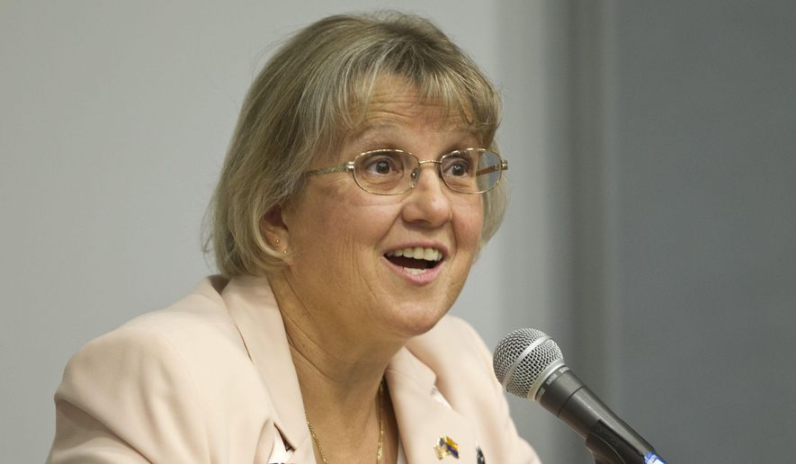 In an Oct. 8, 2012 photo, Glendale city council candidate Diane Douglas speaks during a debate against Gary Sherwood at Midwestern University in Glendale Ariz. Douglas has unabashedly run a one-issue campaign in her bid to become the state’s top education official: outlaw Common Core standards. Traditional Republican groups like the Chamber of Commerce find her views so extreme that they have taken the unusual position of endorsing the Democrat in a race that has been flipped on its head. (AP Photo/The Arizona Republic, Patrick Breen)