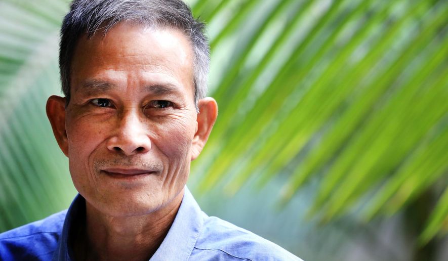 Nguyen Van Hai, one of Vietnam's most prominent dissidents, speaks to the Associated Press on Thursday, Oct. 30, 2014 in Los Angeles after being released from prison and flown to the United States. Hai, who is known as Dieu Cay, was serving a 12-year prison term on charges of spreading "propaganda against the state" through his blogging and citizen media activities. (AP Photo/Richard Vogel)