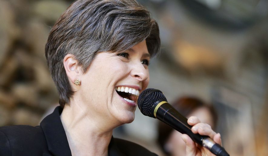 Republican Senate candidate Joni Ernst laughs during a campaign stop in Council Bluffs, Iowa, Friday, Oct. 31, 2014. Ernst is running against Democrat Bruce Braley for the Senate seat of Tom Harkin, who is not seeking reelection. (AP Photo/Nati Harnik)