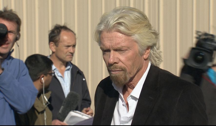 In this video grabbed image, billionaire Virgin Galactic founder Richard Branson, pauses before a news conference in which he saluted the bravery of test pilots, and vowed to find out what caused the crash of his prototype space tourism rocket that killed one crew member and injured another in Mojave, Calif., Saturday, Nov. 1, 2014. Virgin Galactic's SpaceShipTwo blew apart about 20 miles (32 kilometers) from the Mojave airfield after being released from a carrier aircraft Friday. (AP Photo/Scott Fain)