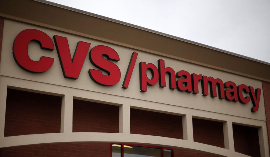 This March 17, 2014, photo shows a CVS/Pharmacy in Dormont, Pa. (AP Photo/Gene J. Puskar) ** FILE **