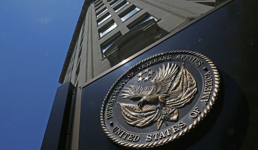 The seal affixed to the front of the Department of Veterans Affairs building in Washington is seen here on June 21, 2013. The number of military suicides is nearly double that of a decade ago when the U.S. was just a year into the Afghan war and hadn&#x27;t yet invaded Iraq. While the pace is down slightly this year, it remains worryingly high. The U.S. military and the Department of Veterans Affairs (VA) acknowledge the grave difficulties facing active-duty and former members of the armed services who have been caught up in the more-than decade-long American involvement in wars in Iraq and Afghanistan. (Associated Press)