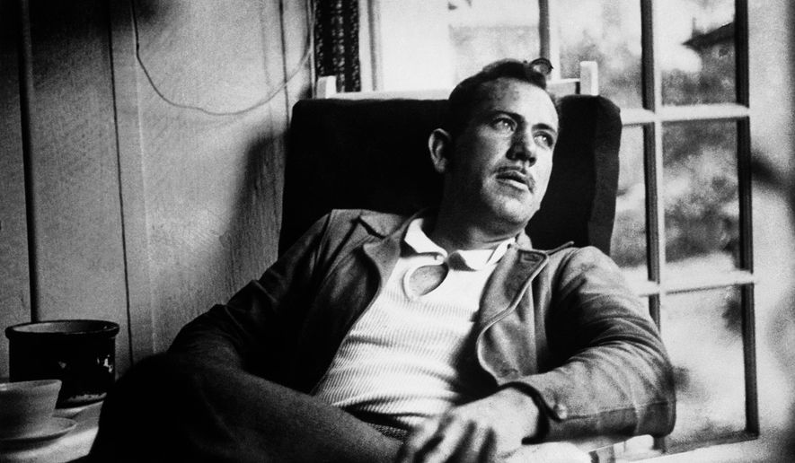 FILE - In an undated file photo, American author John Steinbeck, takes a rest from work on a new novel. A rare Steinbeck WWII story titled "With Your Wings," an inspirational story about a black pilot that Steinbeck wrote for Orson Welles' radio program, and then seemed to disappear, is getting a second release. Andrew F. Gulli, managing editor of the Birmingham, Michigan-based quarterly The Strand Magazine, features it in The Strand's holiday issue, which comes out Friday, Nov. 7, 2014. (AP Photo. File)