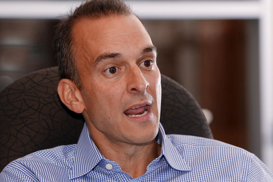 FILE - In this Oct. 16, 2012, file photo, Travis Tygart, the CEO of the U.S. Anti-Doping Agency, speaks during an interview at his office in Colorado Springs, Colo. An Associated Press analysis of the testing protocol, approved by the league and the NFL Players Association after more than three years of wrangling, found that only the most reckless or uninformed player would seem to have a chance of getting caught using HGH, which has become popular in a variety of sports for its supposed ability to enhance performance in various ways. Tygart and other leaders of the anti-doping movement agree that, while checking athletes for that specific performance-enhancer is better than not checking at all, testing alone merely skims the surface of what must be done to find cheaters _ especially given the limitations of a test that only is able to detect synthetic HGH in a person's system for 48 hours. (AP Photo/Ed Andrieski, File)
