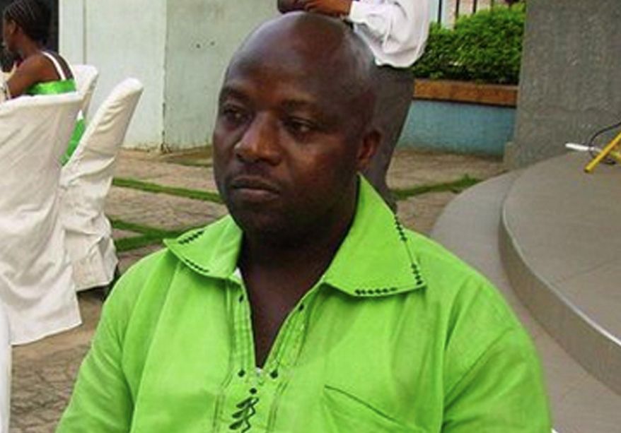This 2011 file photo provided by Wilmot Chayee shows Thomas Eric Duncan at a wedding in Ghana. Thirty-eight days after Duncan was diagnosed with Ebola in a local hospital where he died Oct. 8, Dallas calmly marked the end of its Ebola crisis on Friday, Nov. 7, 2014, when the last of the 177 people who were being monitored for symptoms of the deadly virus were to be cleared at midnight. (AP Photo/Wilmot Chayee, File)