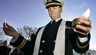 Navy Chaplain Lt. Gordon J. Klingenschmit in front of the White House on Jan. 7, 2006. (Associated Press) ** FILE **