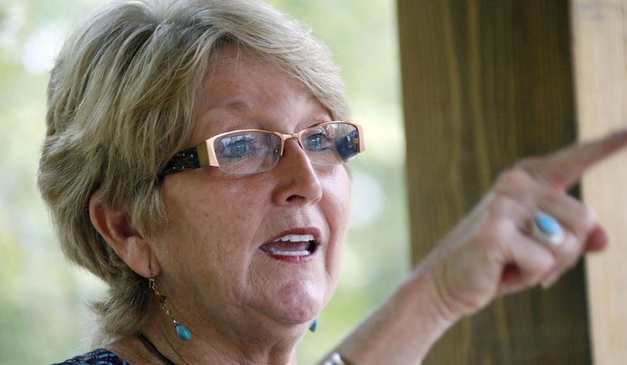 Mary Jane Kennedy, mother to two gay sons speaks about her faith, her belief that God loves them like everyone else and the need for people of faith especially in the Deep South, to envelop gays, lesbians, and transgender people, at her Brandon, Miss., home Wednesday, Nov. 5, 2014. The Washington-based Human Rights Campaign is taking on the region’s longstanding church-based opposition to homosexuality in a series of television commercials, direct-mail messages and phone-bank operations. Commercials will feature people like Kennedy, who’s led Bible studies in her native Mississippi for decades. (AP Photo/Rogelio V. Solis)