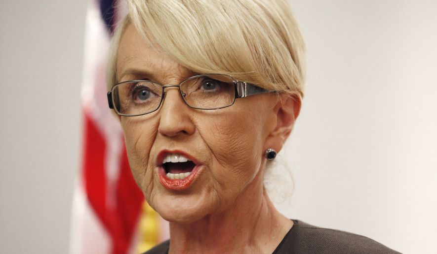 Arizona Republican Gov. Jan Brewer speaks at a news conference in Phoenix on Feb. 26, 2014. (Associated Press) **FILE**