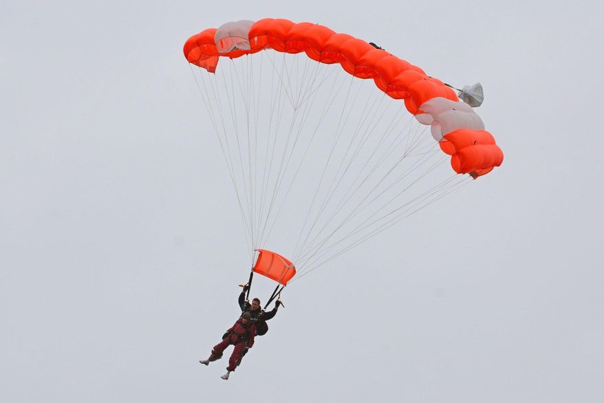 Eleanor Cunningham skydives with Saratoga Skydiving Adventures, Saturday, Nov. 8, 2014, in Gansevoort, N.Y., a day after her 100th birthday. It was Cunningham's third jump, after taking up the sport at age 90. (AP Photo/The Daily Gazette, Patrick Dodson) TROY, SCHENECTADY; SARATOGA SPRINGS; ALBANY AND AMSTERDAM OUT