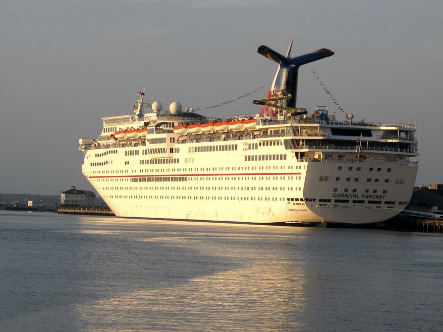 FILE - In a March 20, 2014 file photo, the Carnival Fantasy is moored at dock in Charleston, S.C.. The South Carolina Ports Authority and the state Department of Health and Environmental Control have until Friday, Nov. 21, 2014 to respond to a motion in the state Court of Appeals to toss out a state permit for a planned $35 million cruise terminal in Charleston. (AP Photos/Bruce Smith, file)