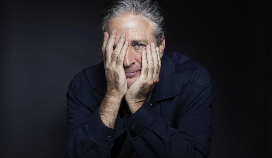 In this Nov. 7, 2014 photo, Jon Stewart poses for a portrait in promotion of his film,"Rosewater," in New York. Stewart, who hosts the political satire series "The Daily Show with Jon Stewart," makes his directorial and screenwriting debut in the film about a journalist who is detained in Iran. (Photo by Victoria Will/Invision/AP)