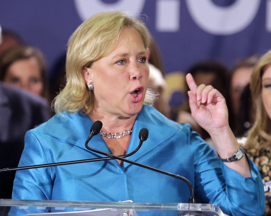 In this photo taken Nov. 4, 2014, Sen. Mary Landrieu, D-La., acknowledges supporters at her election night headquarters in New Orleans. Republicans have promised her Senate opponent Rep. Bill Cassidy a seat on the Senate&#39;s energy committee if he defeats Landrieu in the state&#39;s runoff election next month. The move undercuts one of Landrieu&#39;s chief campaign arguments, that voters in the state with a robust oil and gas industry need her and her seniority on the committee.  (AP Photo/Bill Haber)