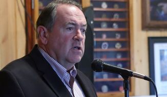 Former Arkansas Gov. Mike Huckabee has taken up a presidential pose, with a new book due out in 10 weeks.  (AP Photo/Steve Cannon) **FILE**