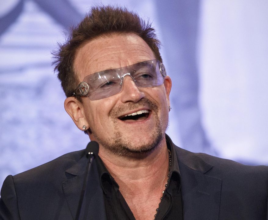 Bono, the Irish rock star and activist, speaks at the Symposium on Global Agriculture and Food Security following an appearance by President Barack Obama at the Ronald Reagan Building in Washington, May 18, 2012. (Associated Press) ** FILE **