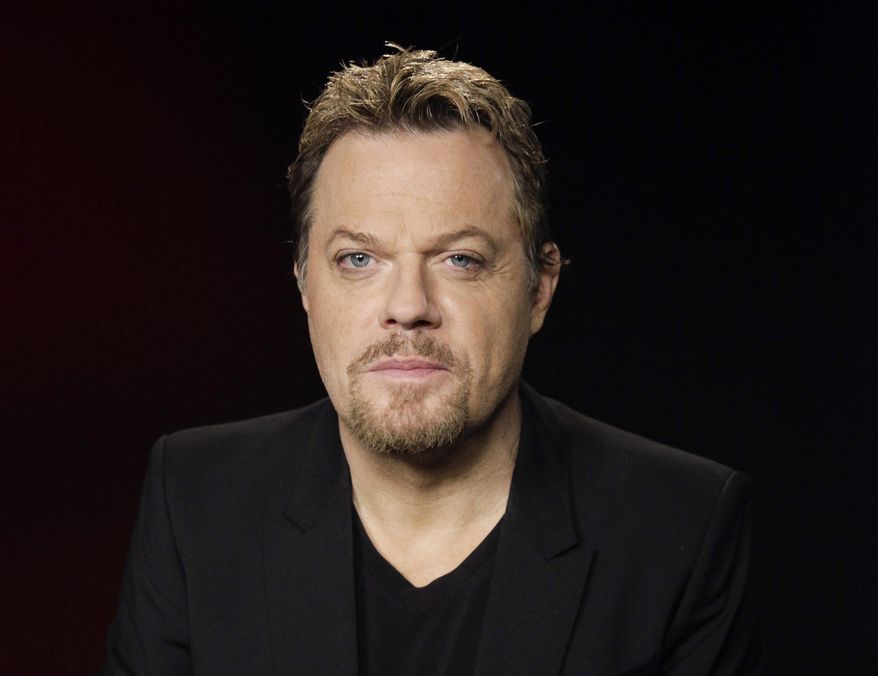 In this file April 30, 2012 photo, Eddie Izzard poses for a portrait in Los Angeles. (AP Photo/Richard Vogel, File)