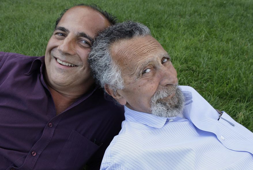 Brothers Ray, left, and Tom Magliozzi, co-hosts of National Public Radio&#39;s Car Talk show, pose for a photo in Cambridge, Mass.  (AP Photo/Charles Krupa, File) (AP Photo/Charles Krupa, File)