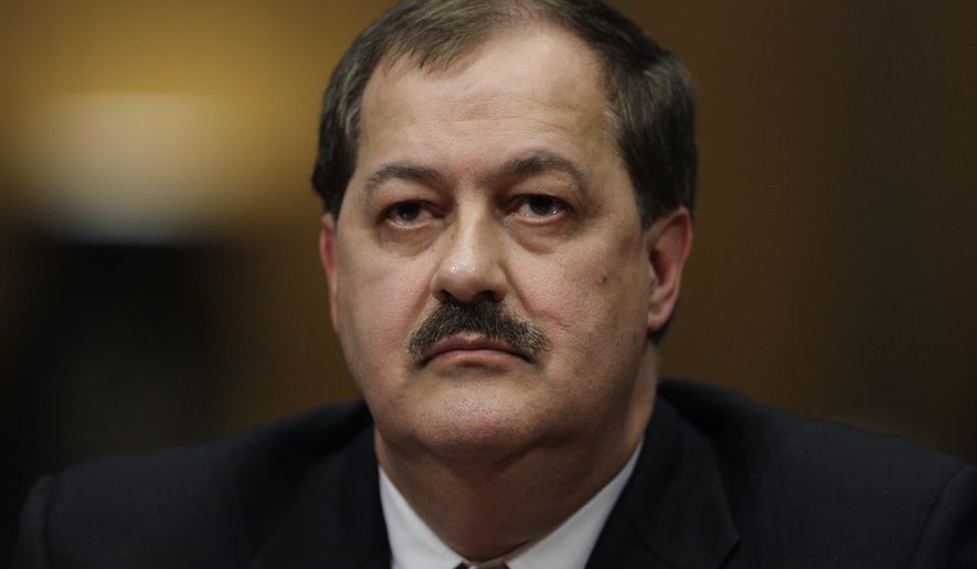 FILE - In this May 20, 2010 photo, Massey Energy Company Chief Executive Officer Don Blankenship pauses as he testifies on Capitol Hill in Washington. The former CEO who oversaw the West Virginia mine that exploded in 2010, killing 29 people, has been indicted on federal charges related to a mine safety investigation. U.S. Attorney Booth Goodwin said a federal grand jury indicted Blankenship on Thursday, Nov. 13, 2014. (AP Photo/Carolyn Kaster, File)