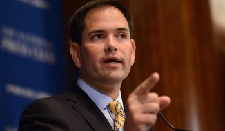 In this May 13, 2014, file photo, Sen. Marco Rubio, R-Fla., speaks at the National Press Club in Washington. (AP Photo/Molly Riley, File)