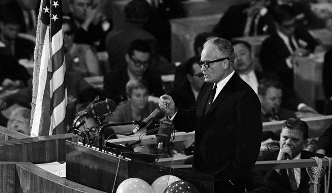 Sen. Barry Goldwater accepts the Republican presidential nomination in San Francisco on July 16, 1964, with a blast at the Democrats and a promise that &quot;together we will win&quot; in the November election. (associated press photographs)