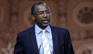 Ben Carson, professor emeritus at Johns Hopkins School of Medicine, speaks in National Harbor, Md., in this March 8, 2014, file photo. (AP Photo/Susan Walsh, File)