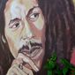 In this Feb. 6, 2013, file photo, a mural depicting reggae music icon Bob Marley decorates a wall in the yard of Marley&#x27;s Kingston home in Jamaica. A U.S. private equity firm announced Tuesday, Nov. 18, 2014 it has joined the family of late reggae star Bob Marley in hopes of building what it touts as the &amp;quot;world&#x27;s first global cannabis brand.&amp;quot; (AP Photo/ David McFadden, File)