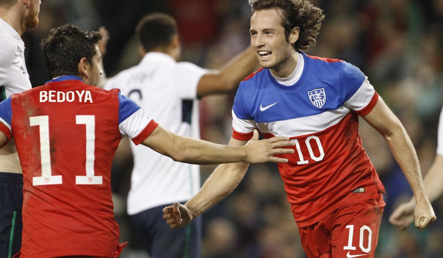 United States&#39; Mix Diskerud, right, and Alejandro Bedoya celebrate after scoring a goal against Republic of Ireland during the international friendly soccer match between the at the Aviva stadium, Dublin, Ireland, Tuesday, Nov. 18, 2014. (AP Photo/Peter Morrison)